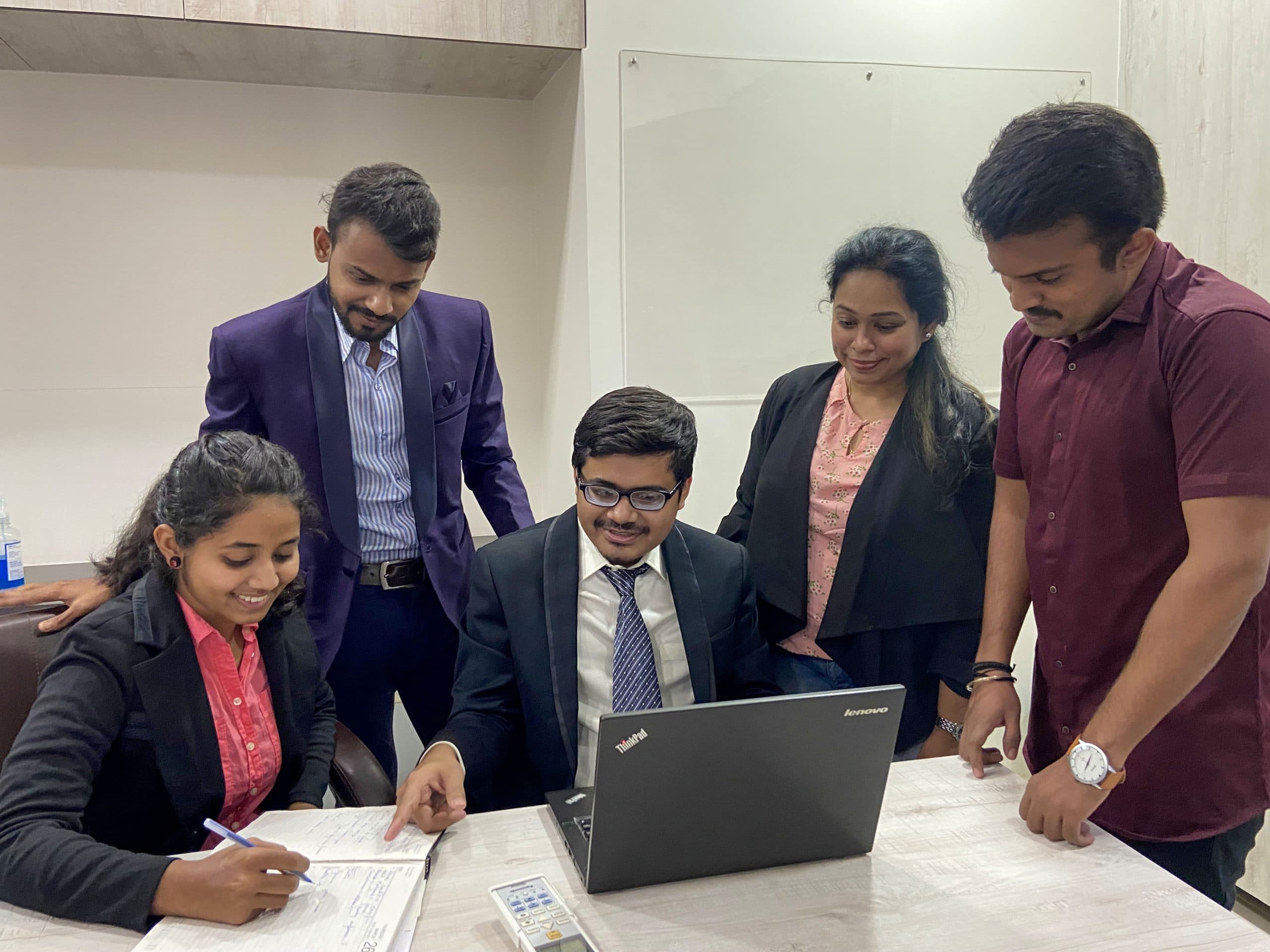 Team discussing outsourcing strategy